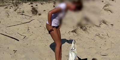 Alluring babe on the beach wants to give him a tease
