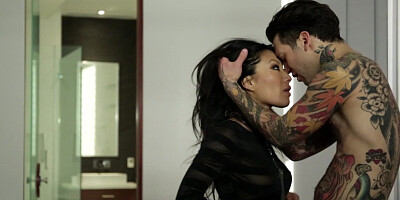 Asian babe is fucking a tattooed stud