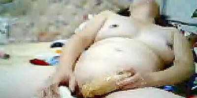 Chinese Mature uses dildo on webcam