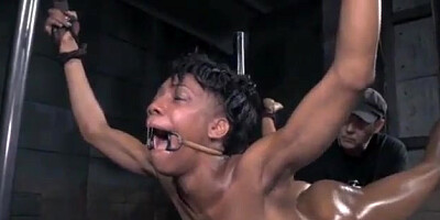 Ebony doll is bellowing from delectation while being bound up, taut and being coerced to jism