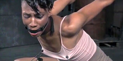 Ebony doll is bellowing from delectation while being bound up, taut and being coerced to jism