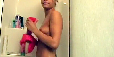 Hot blonde farting in the shower