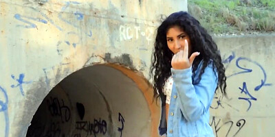 Curly-haired Latina facialized after encounter inside the pipe