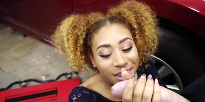 Curly-haired Ebony gal seduces white mechanic in the garage
