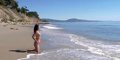 Asian beach babe fingering her tight pussy
