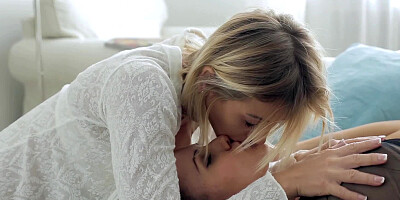 Two girls are making lesbian love with their large rubber toys