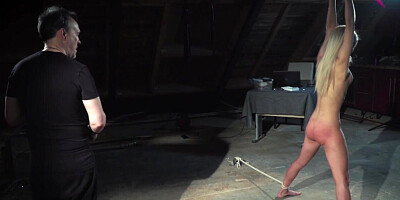 Man shows the Hungarian blonde what BDSM means