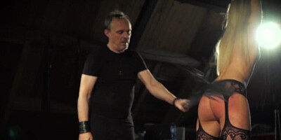 Man shows the Hungarian blonde what BDSM means