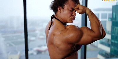 Korableva is a sport model who loves to showcase her muscles in front of the camera