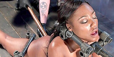 Ebony Captured In Metal Device Toyed