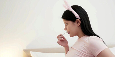 A petite girl with a tight cunt is masturbating