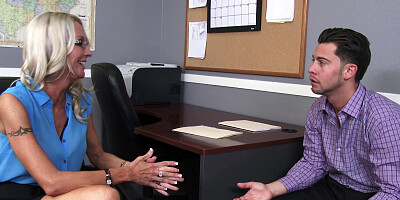 Boss Emma Starr makes employee work between her legs to keep his job