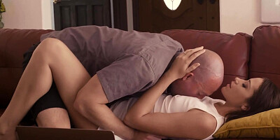 Young brunette Avi Love pleasures bald-headed dude on the sofa