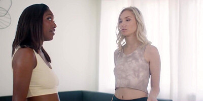 Ebony girl licks her gf under the table