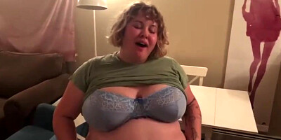 Meaty fuckslut, Alice is licking and demonstrating her large abdomen, in front of the camera