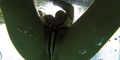 August Ames frolics in a swimming pool with her huge curves