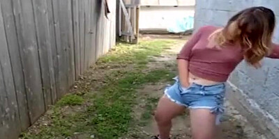 Inexperienced light-haired girl is caressing her moist cooter in the middle of the day, in personal backyard