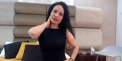 Mature Latina lady fingers herself on webcam