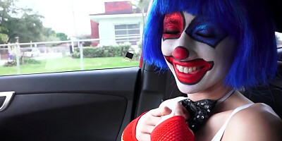 Clown girl sucks cock in a car like a real circus freak