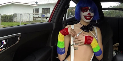 Clown girl sucks cock in a car like a real circus freak