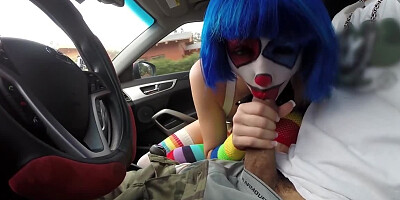 Clown girl sucks cock in a car like a real circus freak