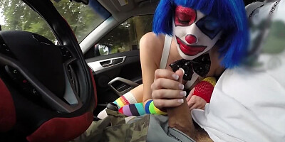 Clown girl sucks cock in a car like a real circus freak