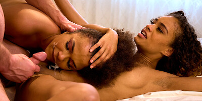 Scarlit Scandal and Alina Ali pleasuring horny white dude in bed