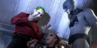 Superhero Kleio Valentien sandwiched between Joker and Batman