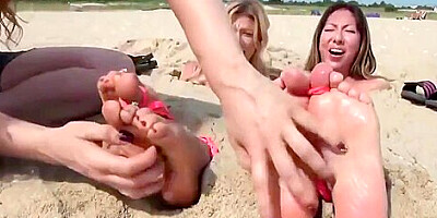 Two girls ticklish beach day