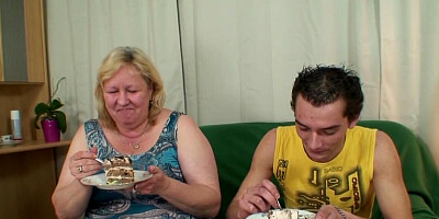Limp dick of a skinny lad is sucked by a blonde GILF