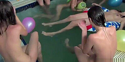 Russian/Ukrainian nude girls playing in pool