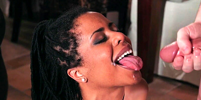 Kira Noir smiles while getting her tight anus drilled