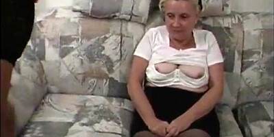 Big-Titted grandmother looks scarcely ridiculous in her taut top and brief mini micro-skirt, but there is no doubt that she is damn excellent in sofa