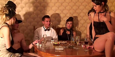 Teen jumps on the table and starts stripping to rock the party