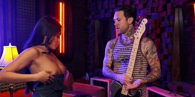 Asian is fucked in mouth and pussy by guitar player in nightclub