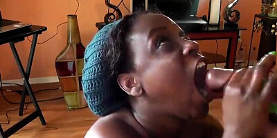 Dark-Hued man-meat cocksucker is getting torn up from the back and providing a fellatio to her roomy