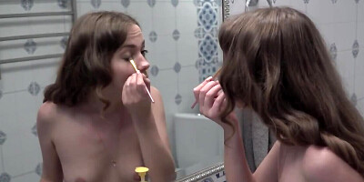 Amanda spreads her legs in the bedroom and rubs her wet pussy