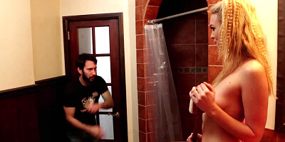 A blonde is in the bathroom, having a weekend to remember with a guy