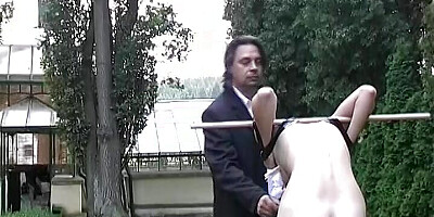 Scared girl is punished as a slave in public for the first time