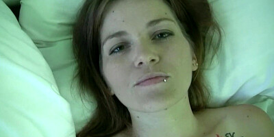 Brunette with a sex toy masturbates sensually