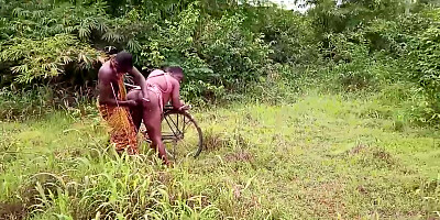 Round, African lady is about to get humped in the nature, until she gets downright sated