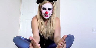 Clown Girl has big lotioned feet and toes to seduce you with, get dick out