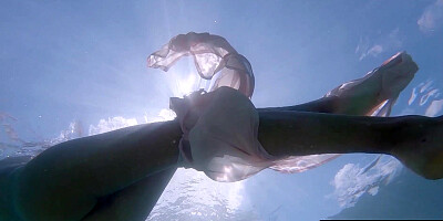Naked Russian teasing under the water