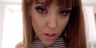 A redhead with a nice body is giving a blow job in front of the camera