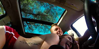 Slutty chick is blowing her partner while he is driving