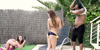 Tyra Moon rides a BBC by the pool in front of a camera