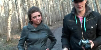 Brunette gives double blowjob while getting half-naked in the forest