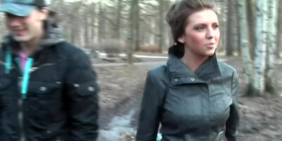 Brunette gives double blowjob while getting half-naked in the forest