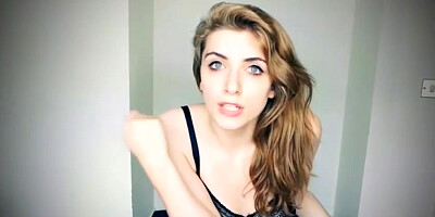 Captivating blondie gal in softcore, black undergarments and high high-heeled slippers is posing on live web cam and taunting