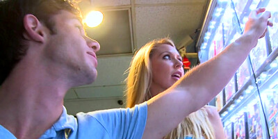 Busty blonde Brynn Tyler has fun with a fan